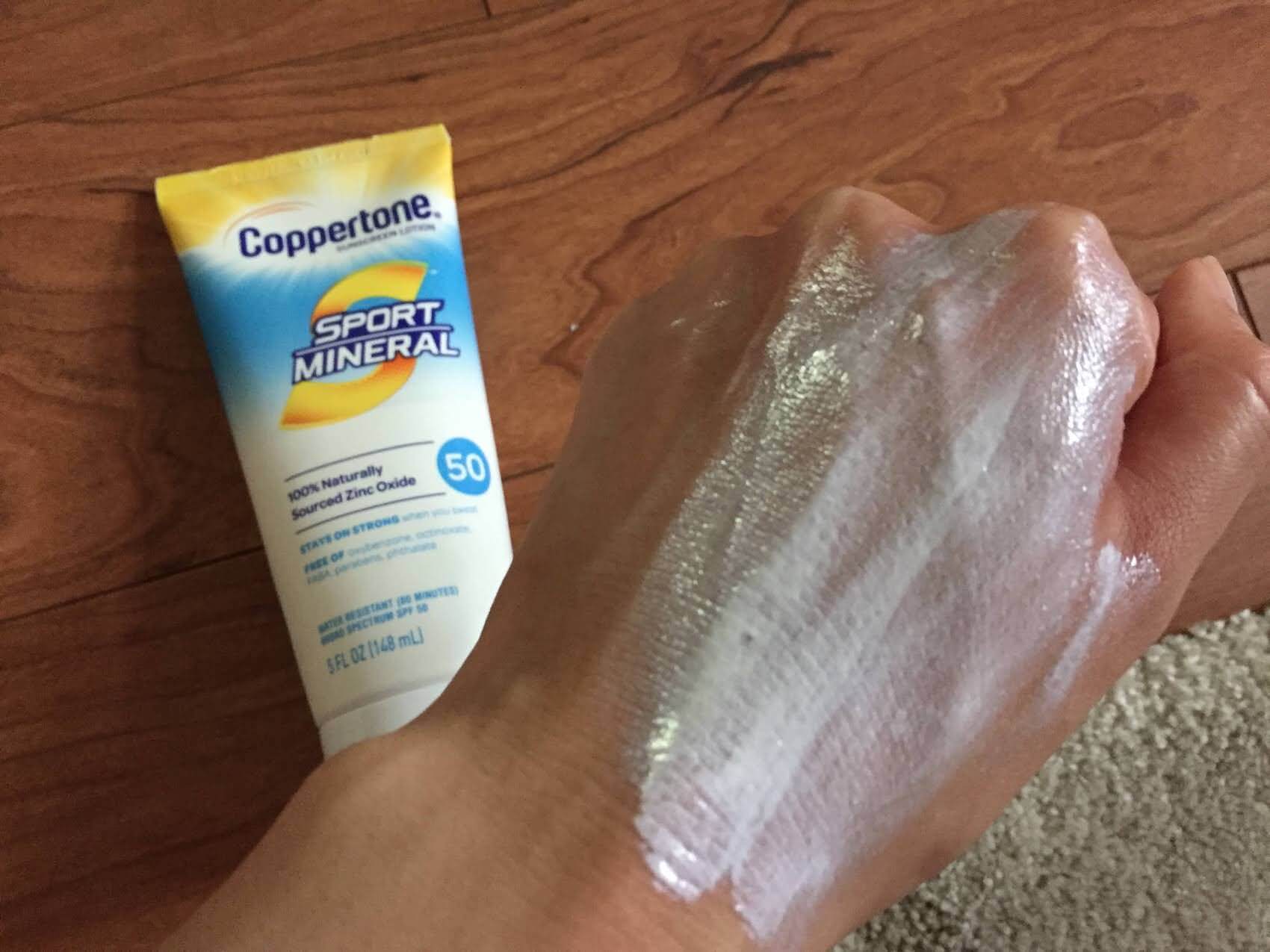 Coppertone Sport Mineral Sunscreen SPF 50 Lotion rubbing into skin